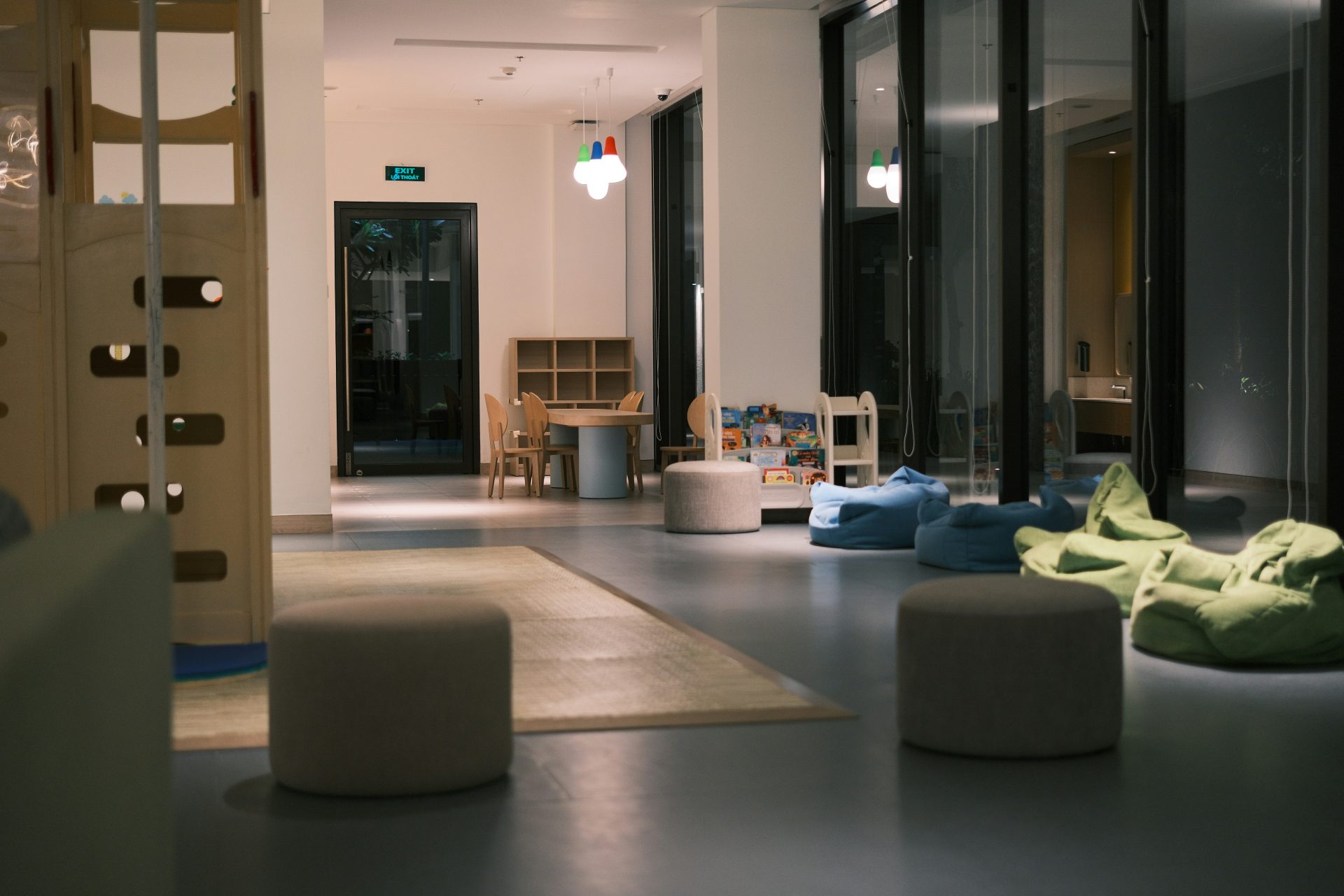 Modern lounge area with beanbag chairs and seating.